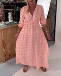 Robe élégante à imprimé cœur et décolleté en V