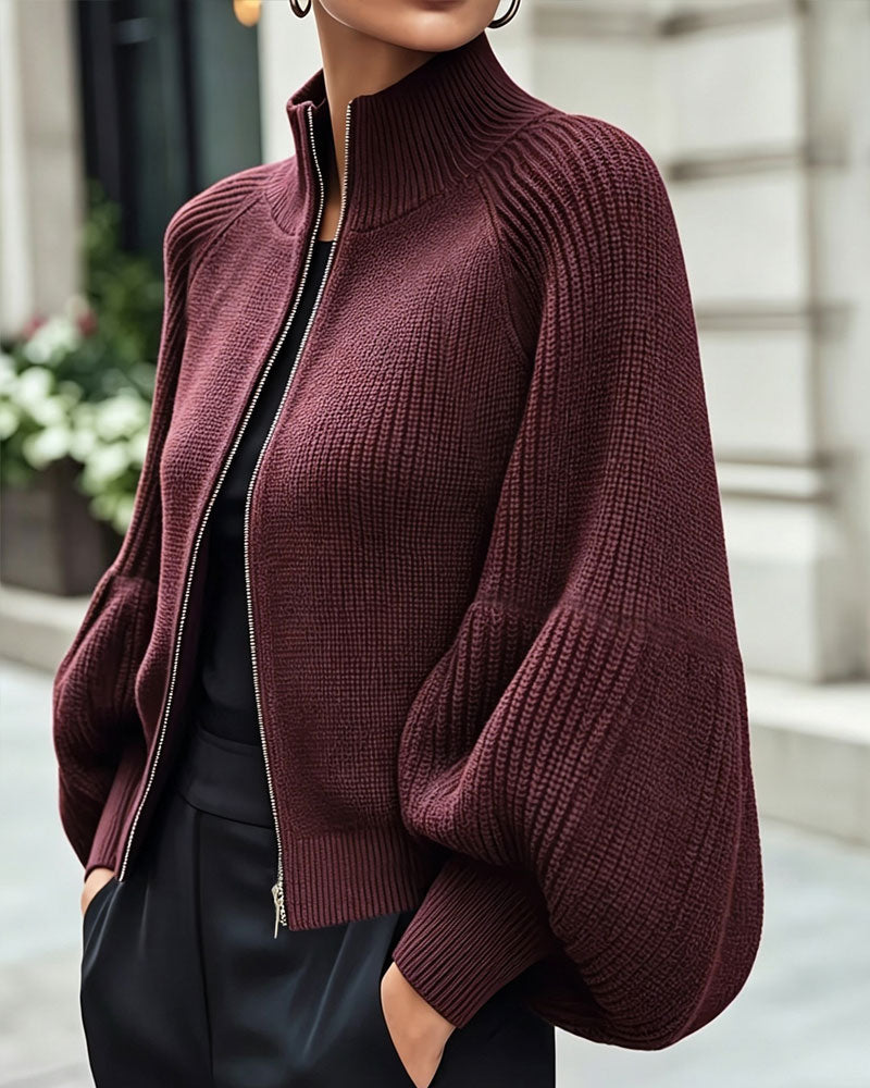 Manteau à col montant et manches lanternes avec fermeture éclair