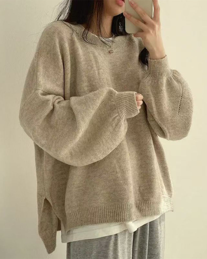 Pull à col rond avec fente sur le côté