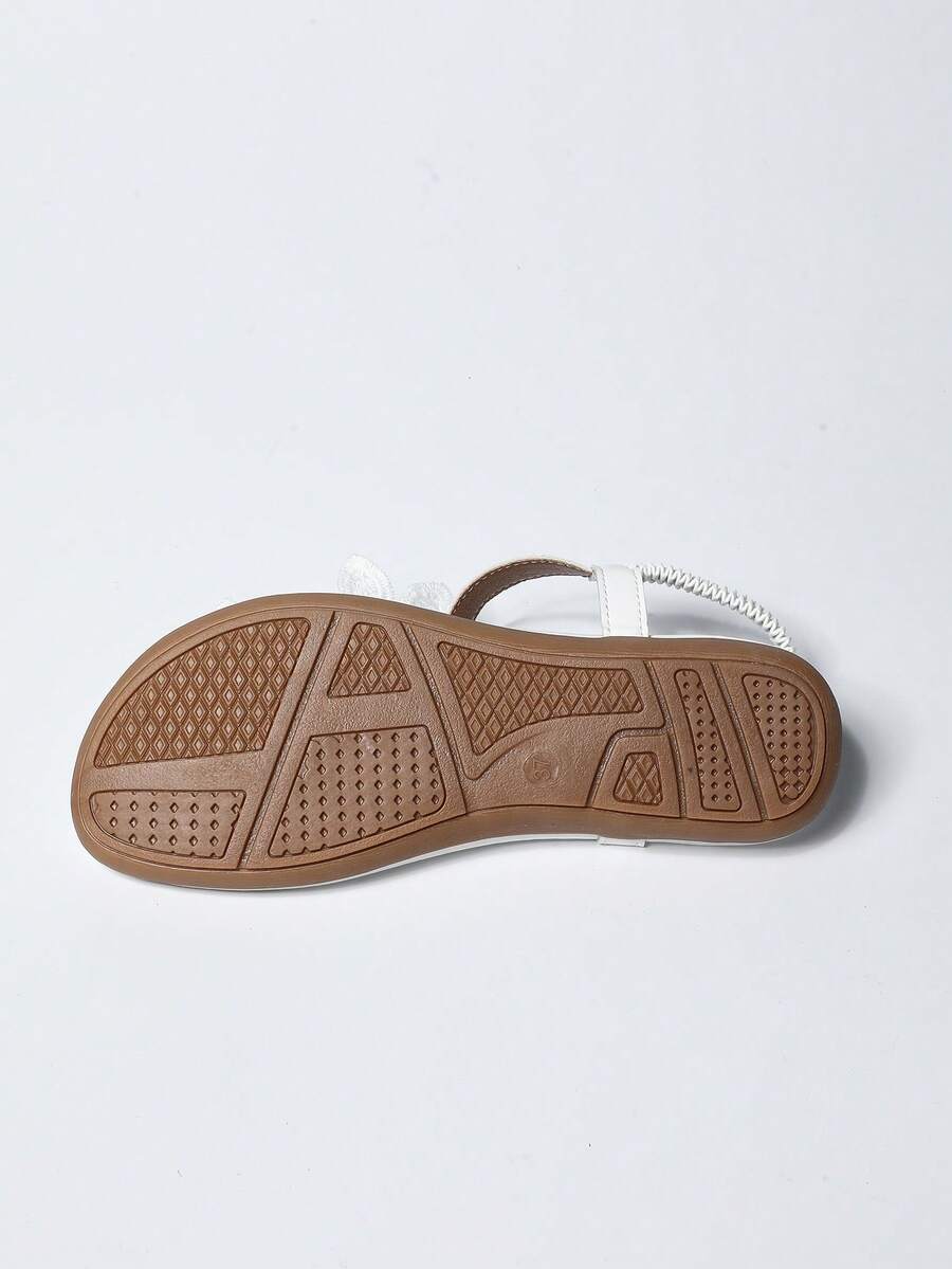 Zeulina | Tongs confortables avec détail floral