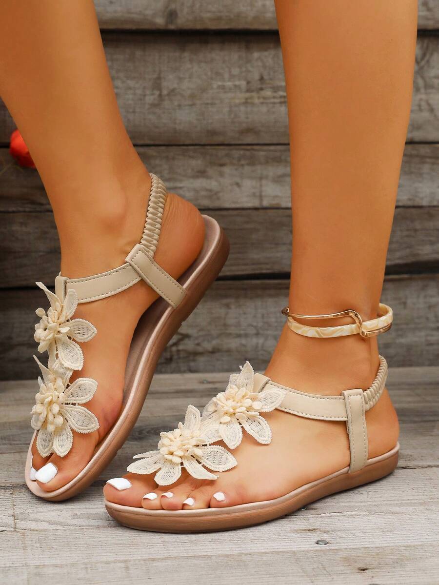 Zeulina | Tongs confortables avec détail floral