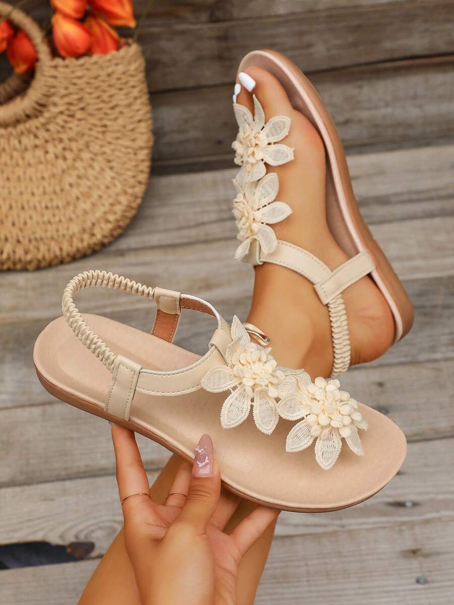 Zeulina | Tongs confortables avec détail floral