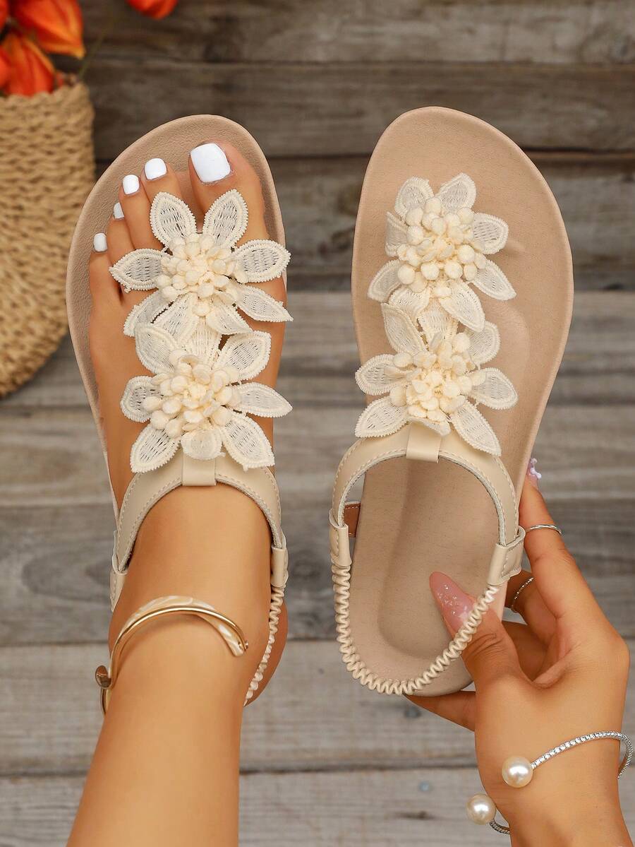 Zeulina | Tongs confortables avec détail floral