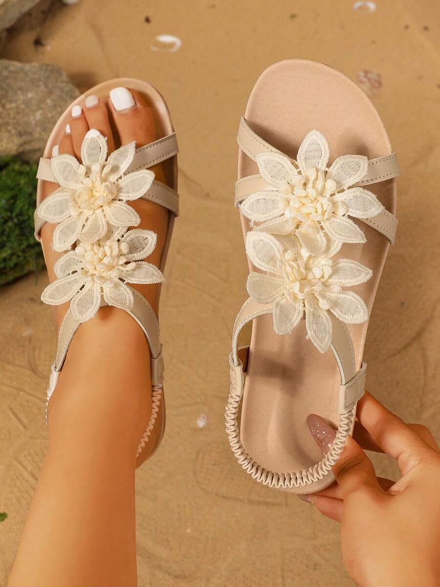 Zeulina | Tongs confortables avec détail floral