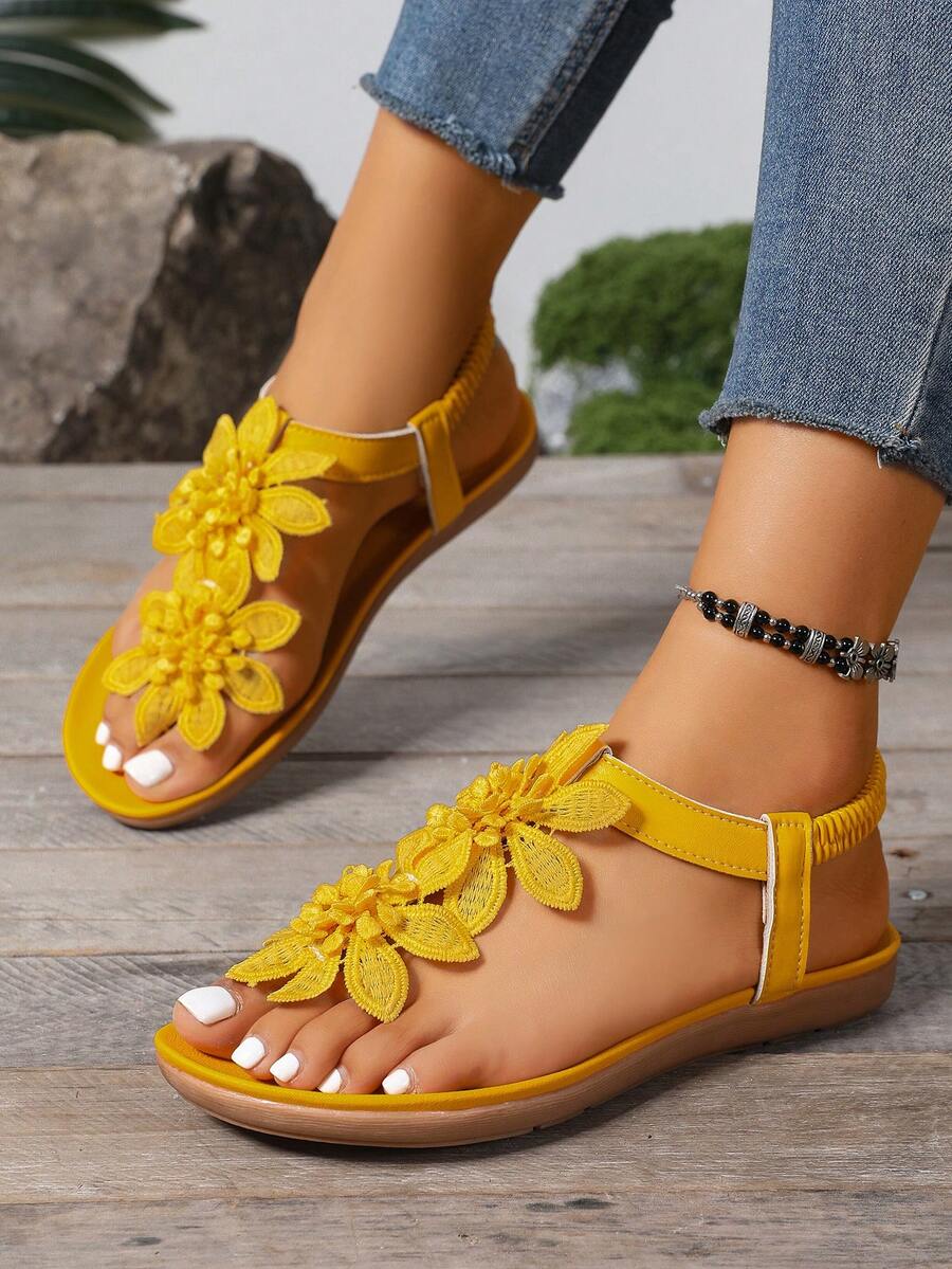 Zeulina | Tongs confortables avec détail floral