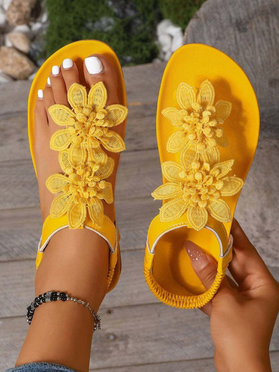 Zeulina | Tongs confortables avec détail floral
