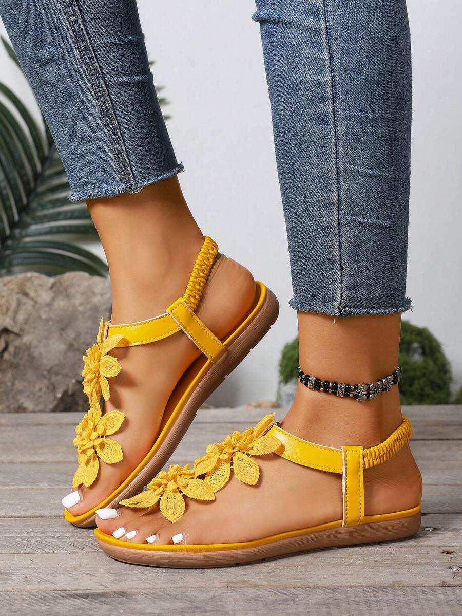 Zeulina | Tongs confortables avec détail floral