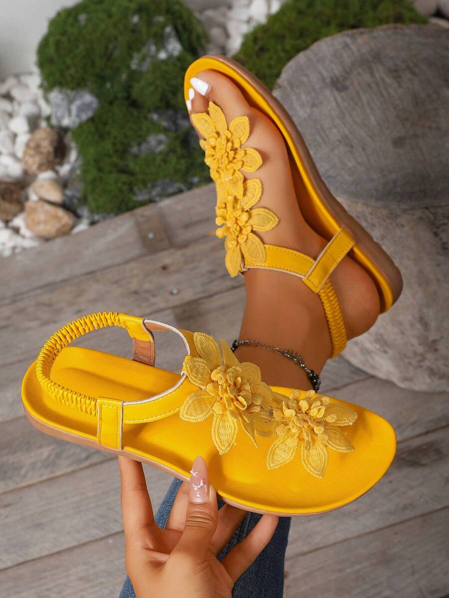 Zeulina | Tongs confortables avec détail floral