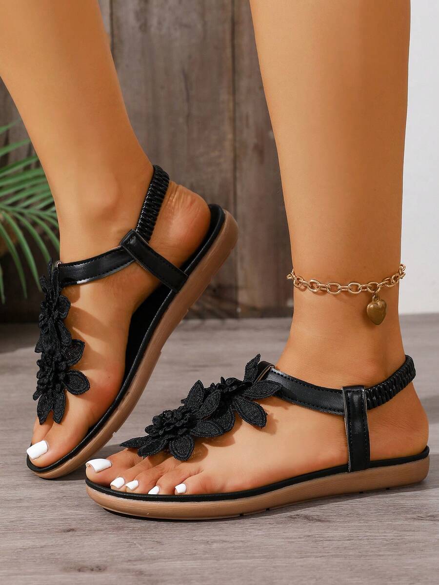 Zeulina | Tongs confortables avec détail floral