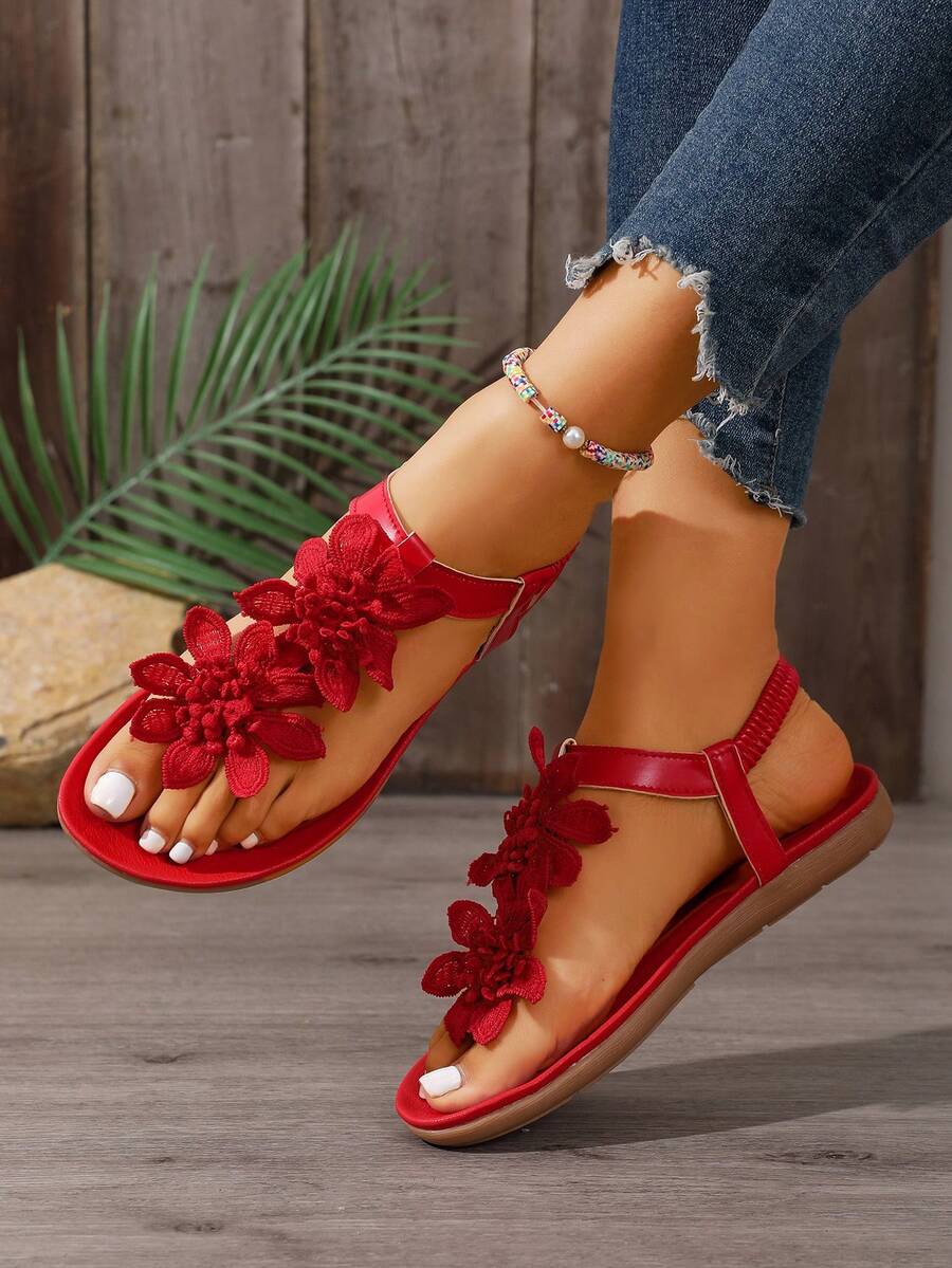 Zeulina | Tongs confortables avec détail floral