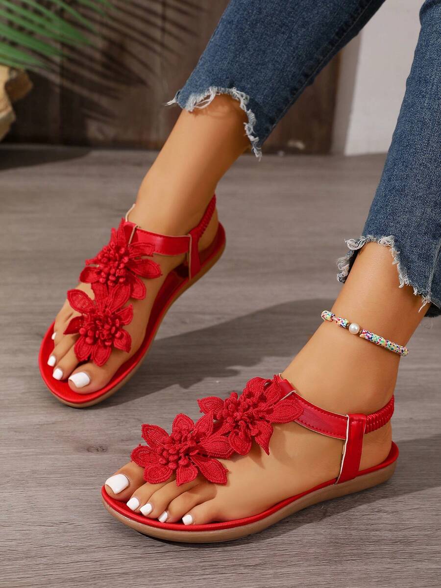 Zeulina | Tongs confortables avec détail floral