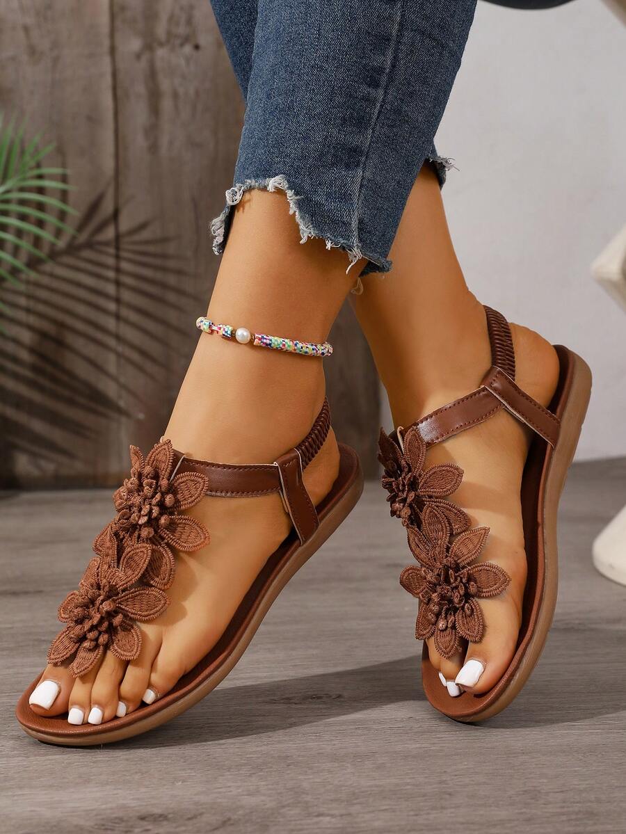 Zeulina | Tongs confortables avec détail floral