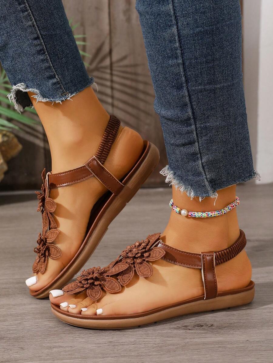 Zeulina | Tongs confortables avec détail floral