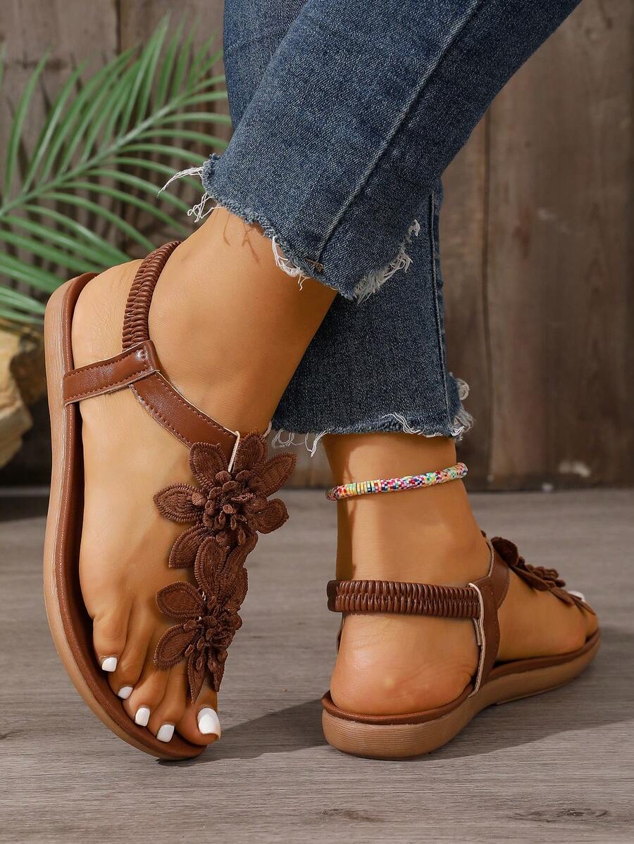 Zeulina | Tongs confortables avec détail floral