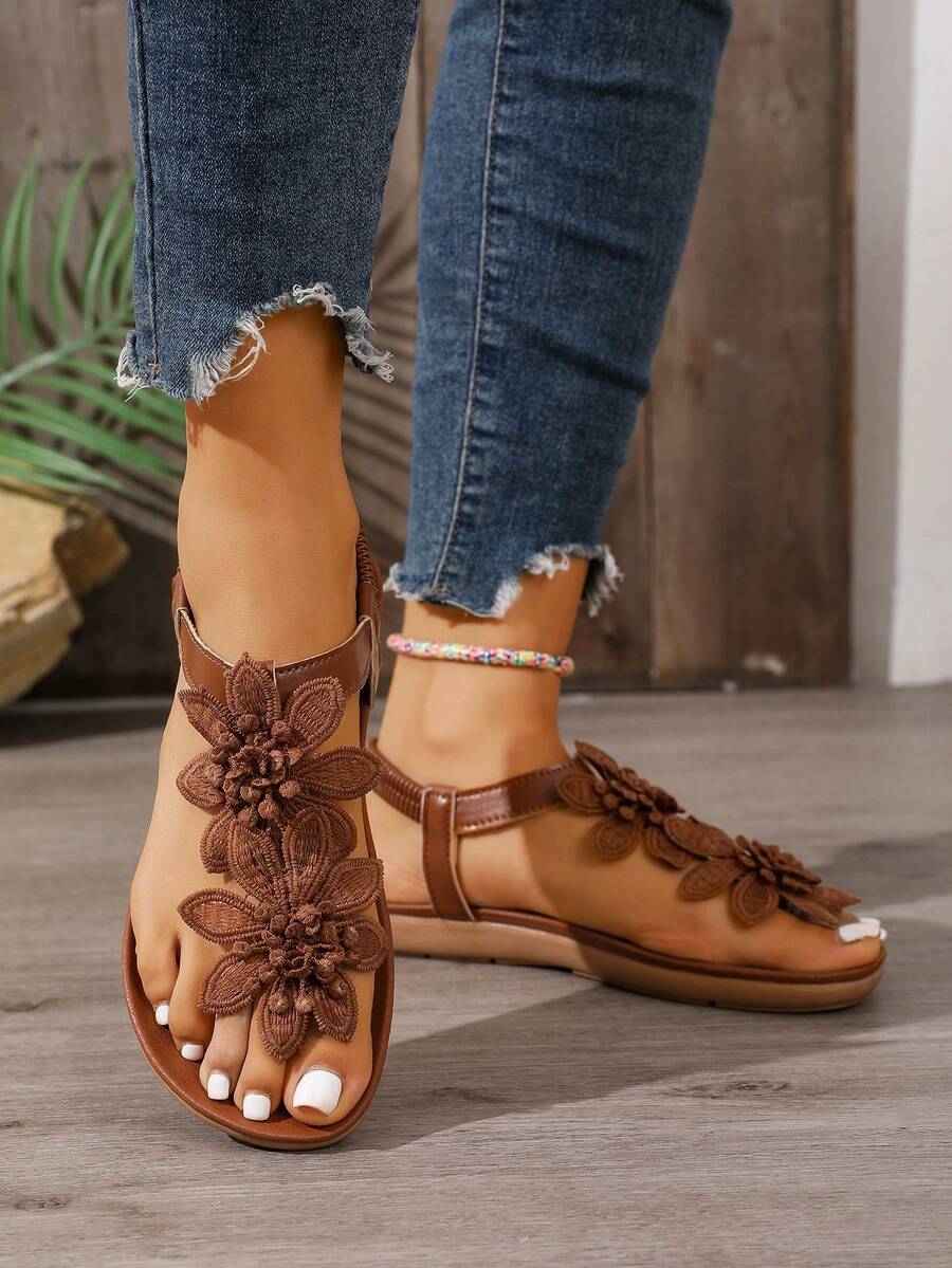 Zeulina | Tongs confortables avec détail floral
