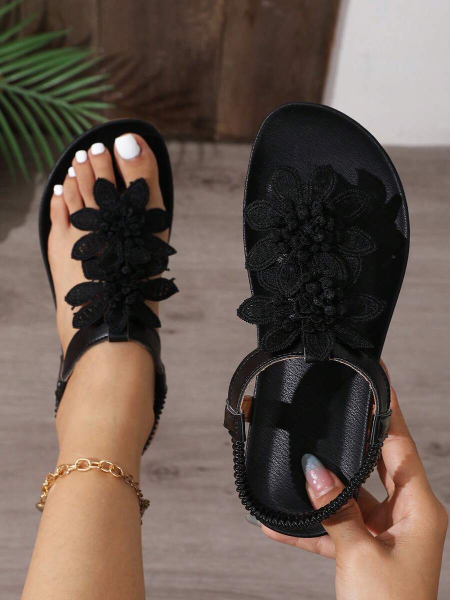 Zeulina | Tongs confortables avec détail floral