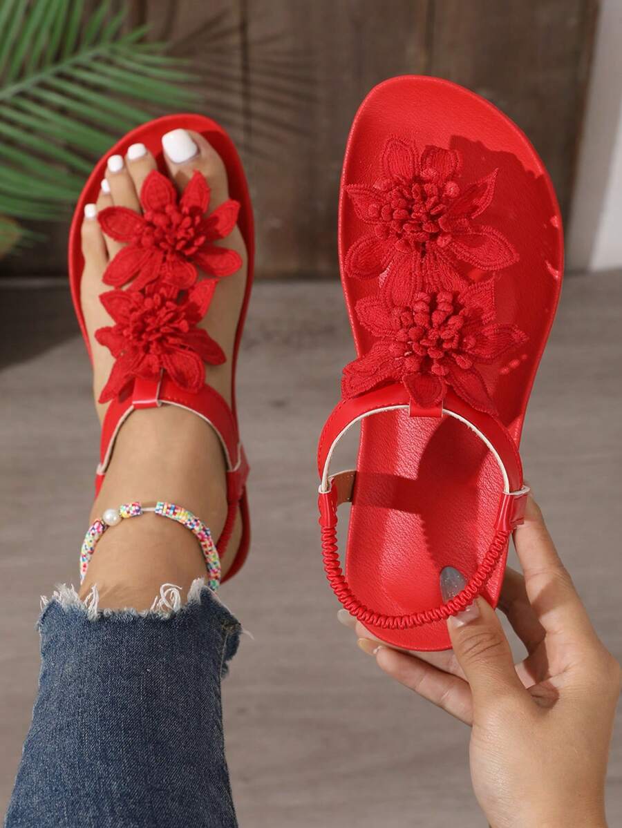 Zeulina | Tongs confortables avec détail floral