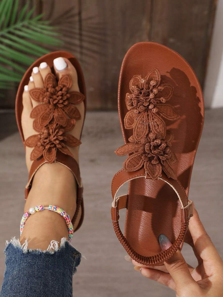 Zeulina | Tongs confortables avec détail floral