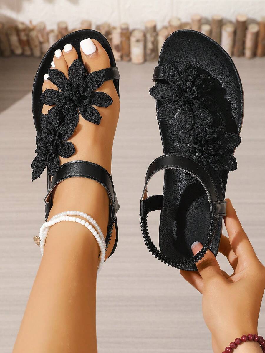 Zeulina | Tongs confortables avec détail floral