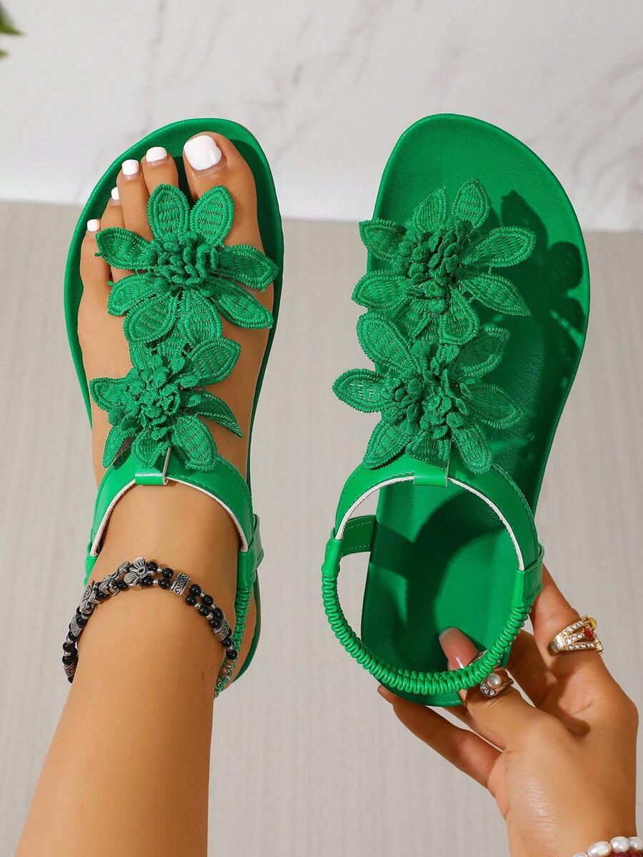 Zeulina | Tongs confortables avec détail floral