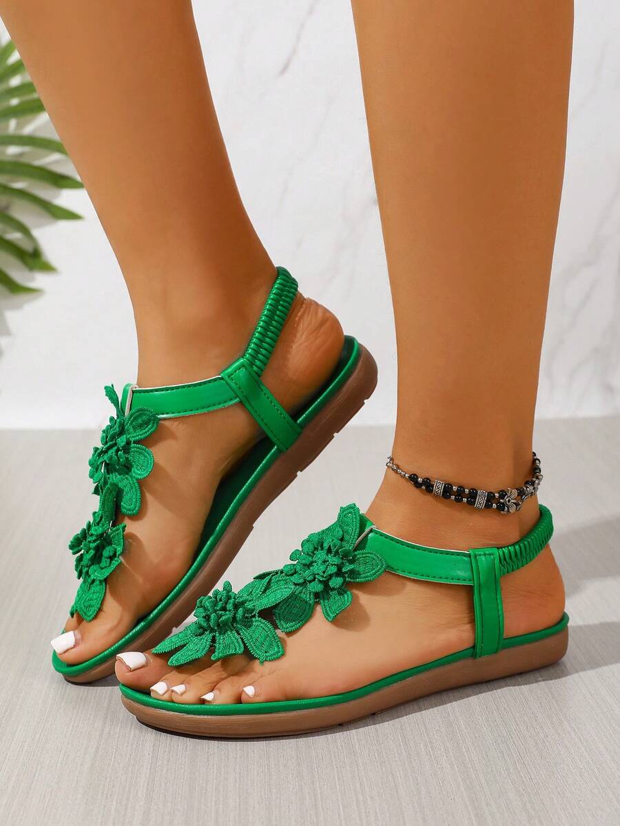 Zeulina | Tongs confortables avec détail floral