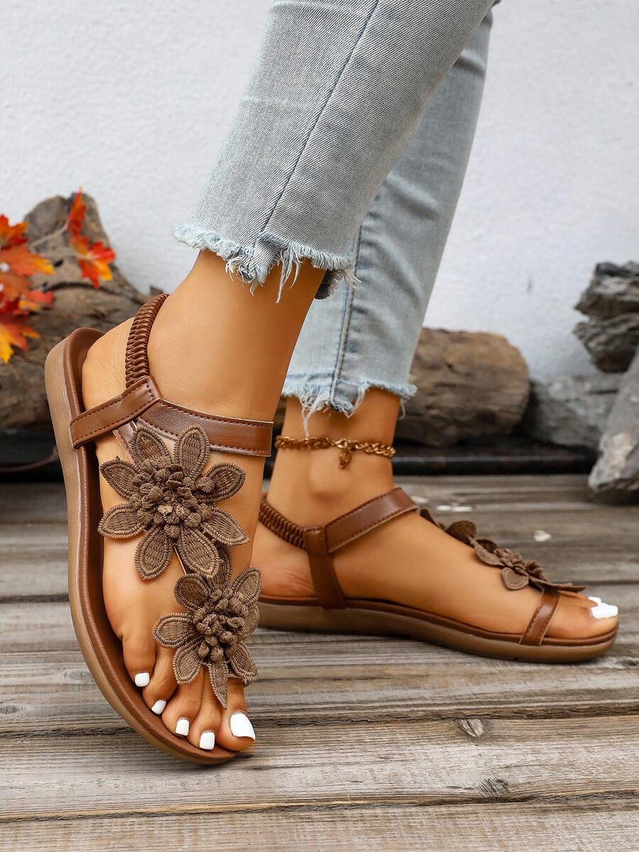 Zeulina | Tongs confortables avec détail floral