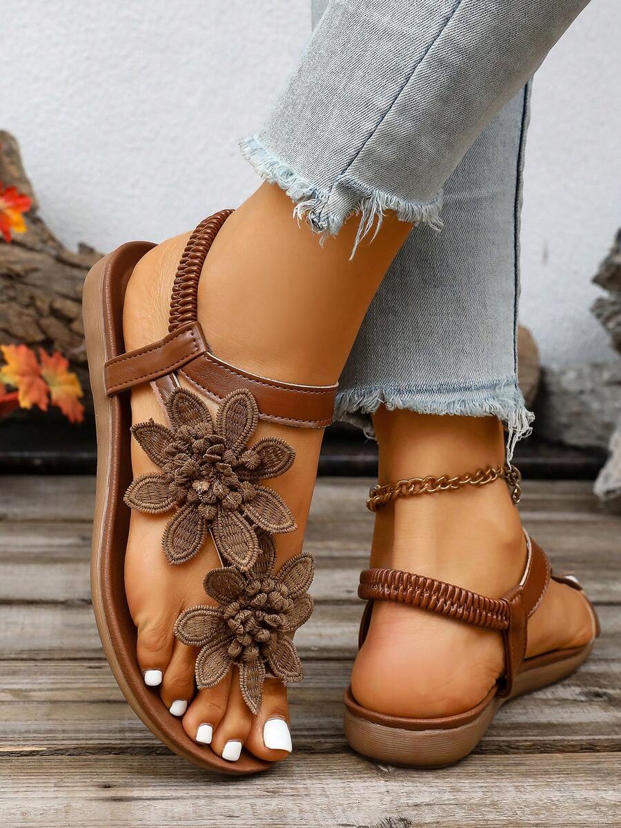 Zeulina | Tongs confortables avec détail floral