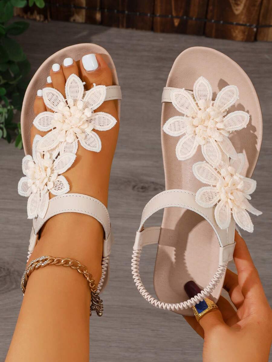 Zeulina | Tongs confortables avec détail floral