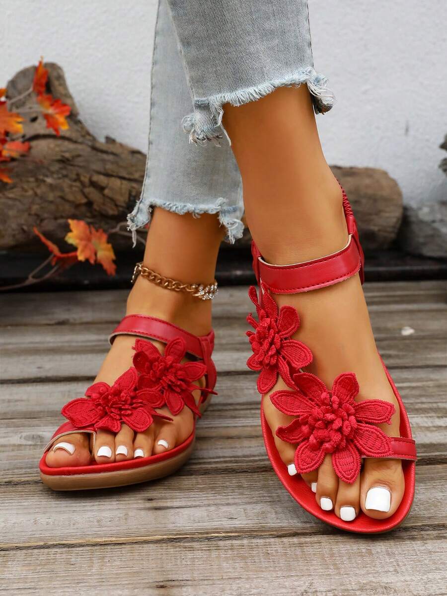 Zeulina | Tongs confortables avec détail floral