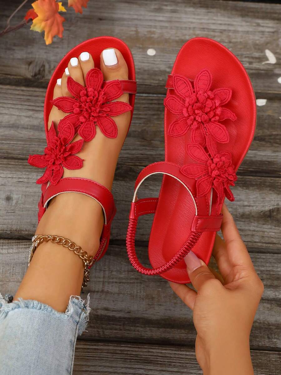 Zeulina | Tongs confortables avec détail floral