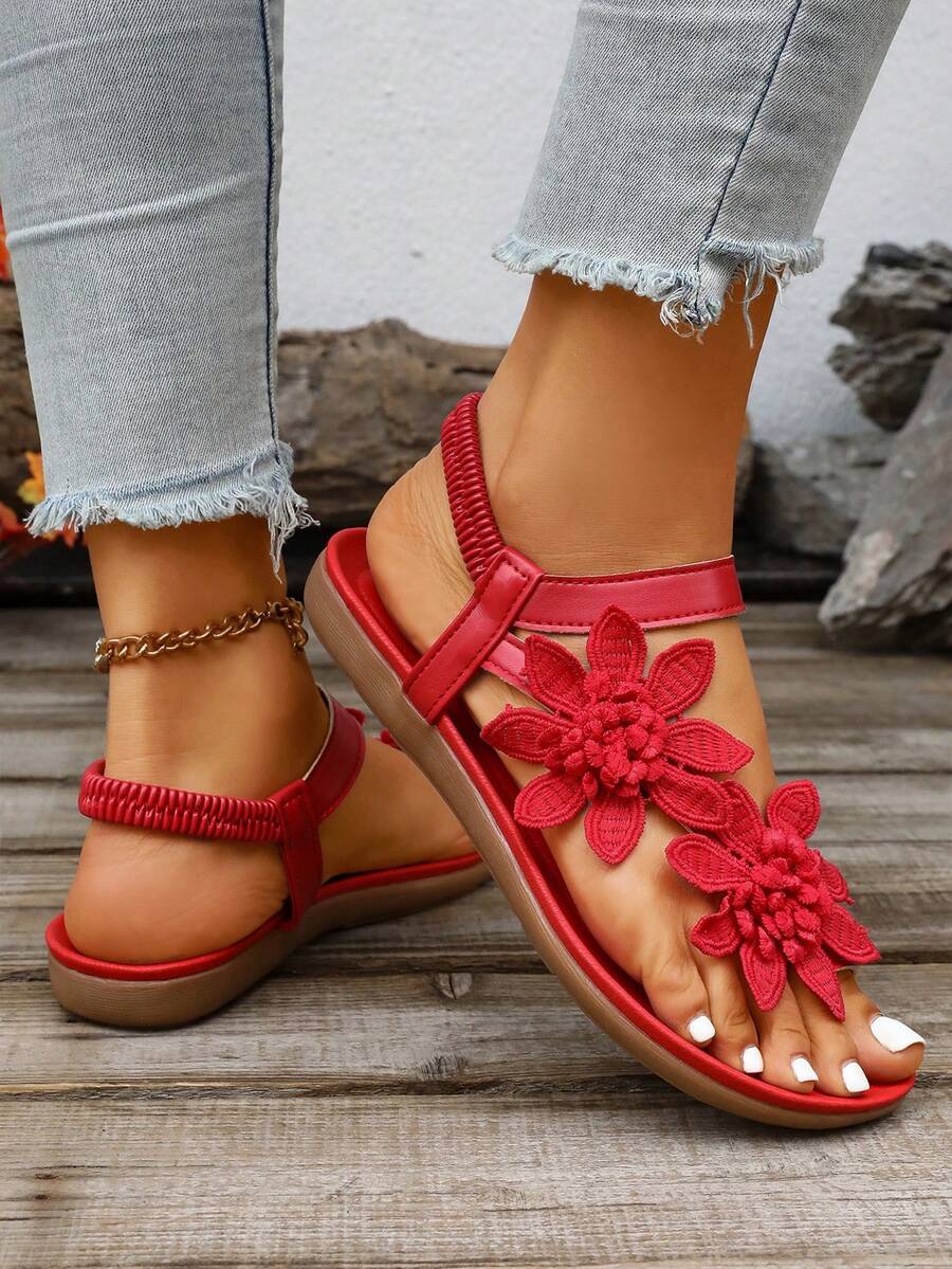 Zeulina | Tongs confortables avec détail floral