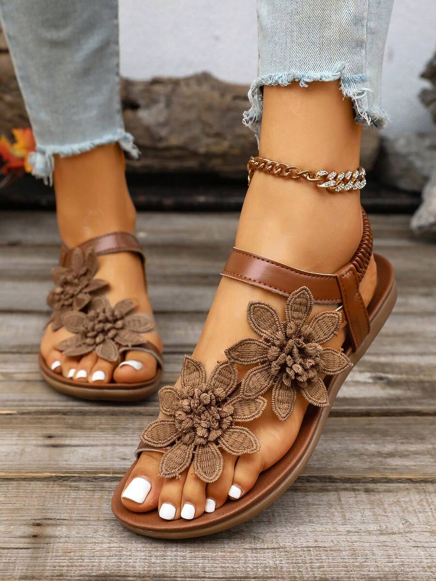 Zeulina | Tongs confortables avec détail floral