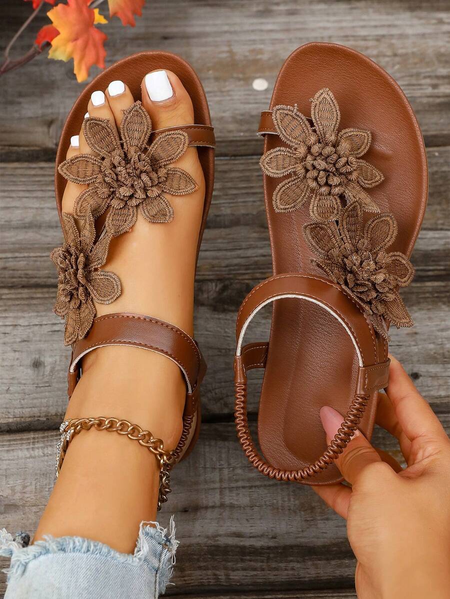 Zeulina | Tongs confortables avec détail floral