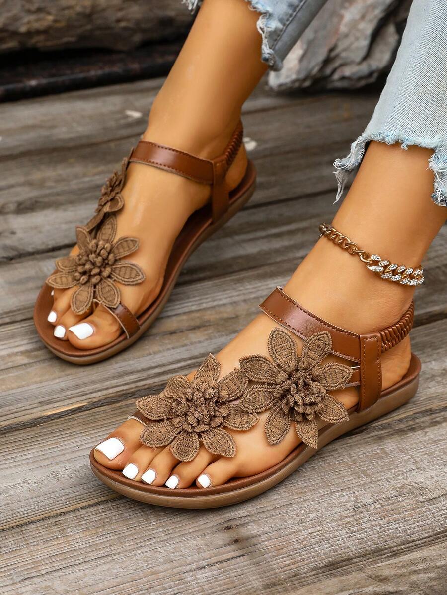 Zeulina | Tongs confortables avec détail floral
