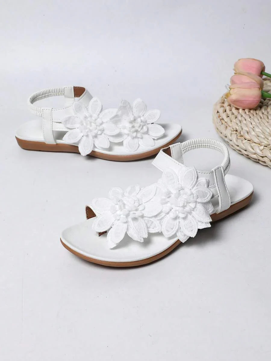 Zeulina | Tongs confortables avec détail floral