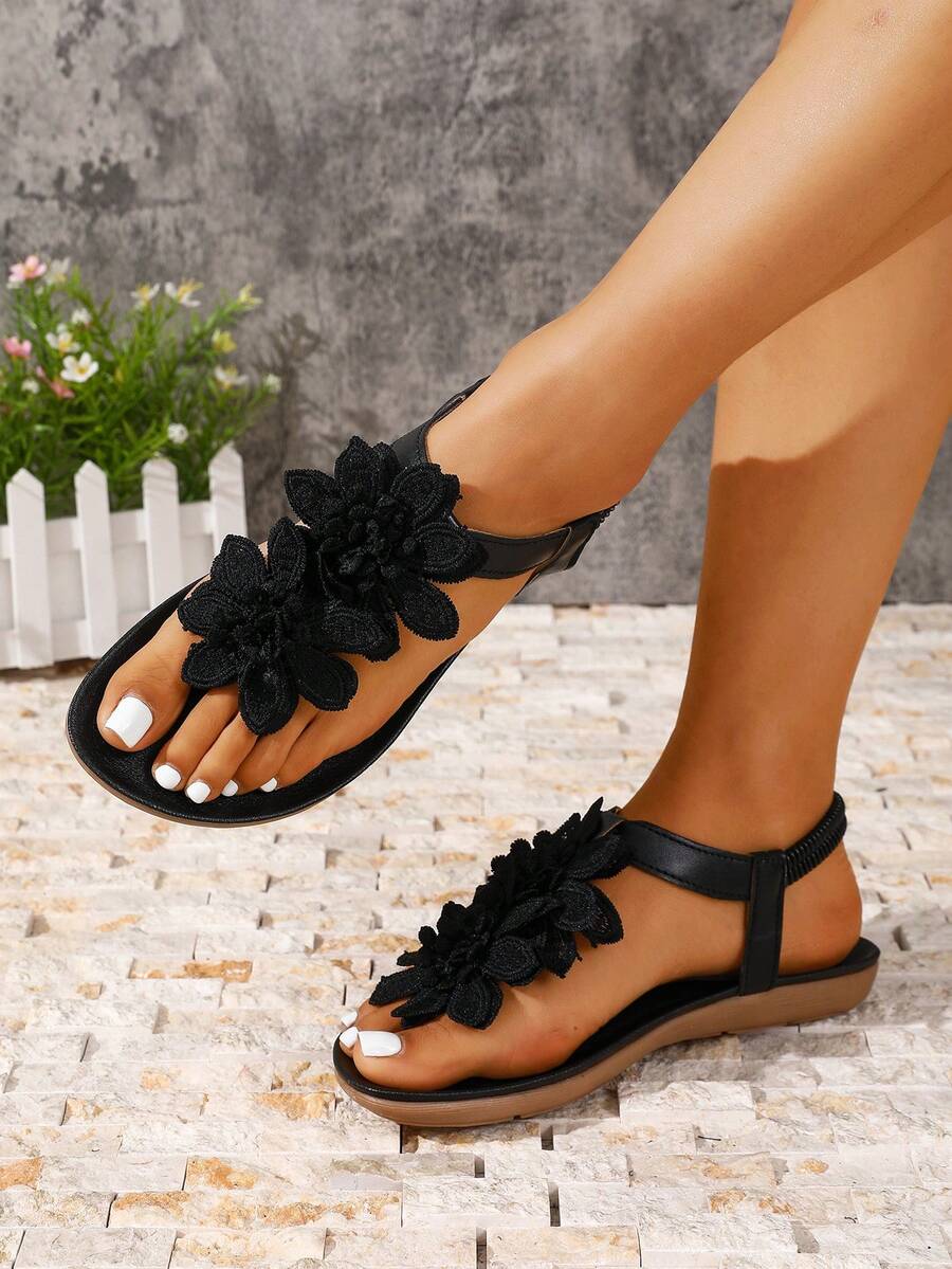 Zeulina | Tongs confortables avec détail floral