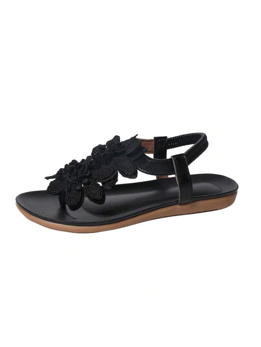 Zeulina | Tongs confortables avec détail floral