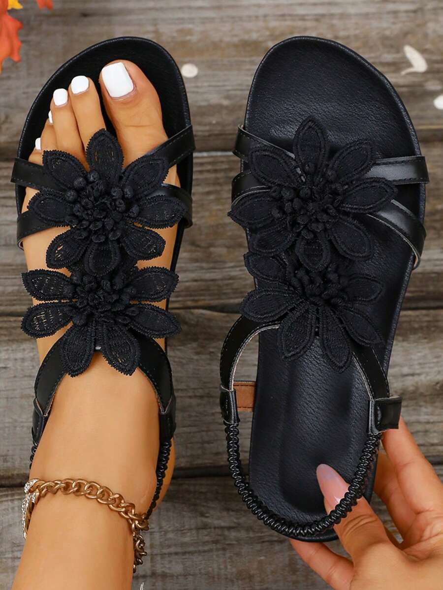 Zeulina | Tongs confortables avec détail floral