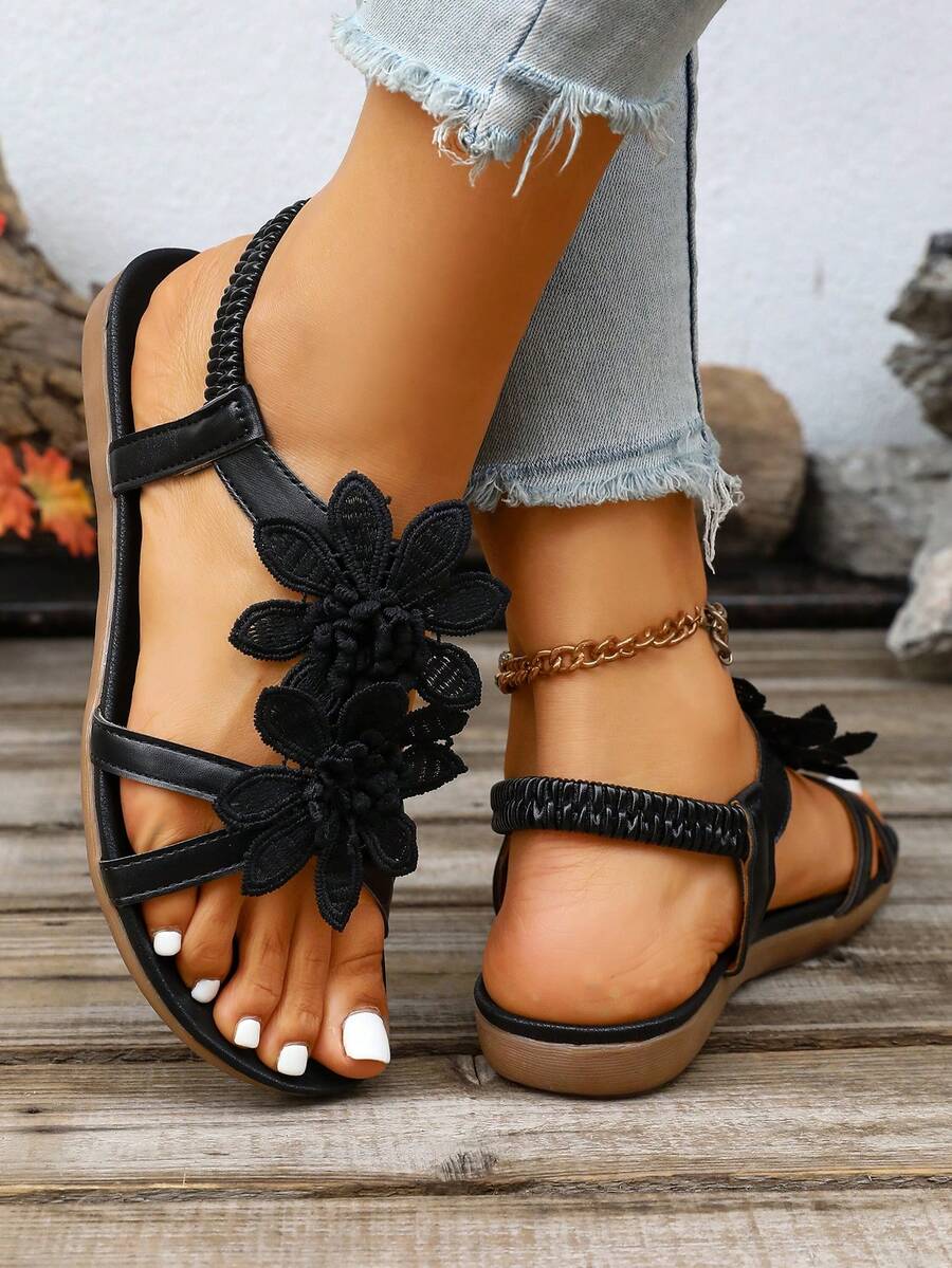 Zeulina | Tongs confortables avec détail floral