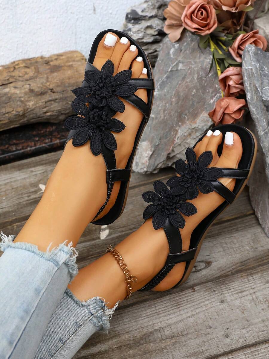 Zeulina | Tongs confortables avec détail floral