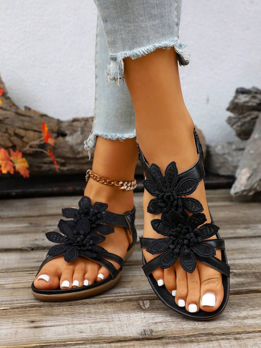Zeulina | Tongs confortables avec détail floral