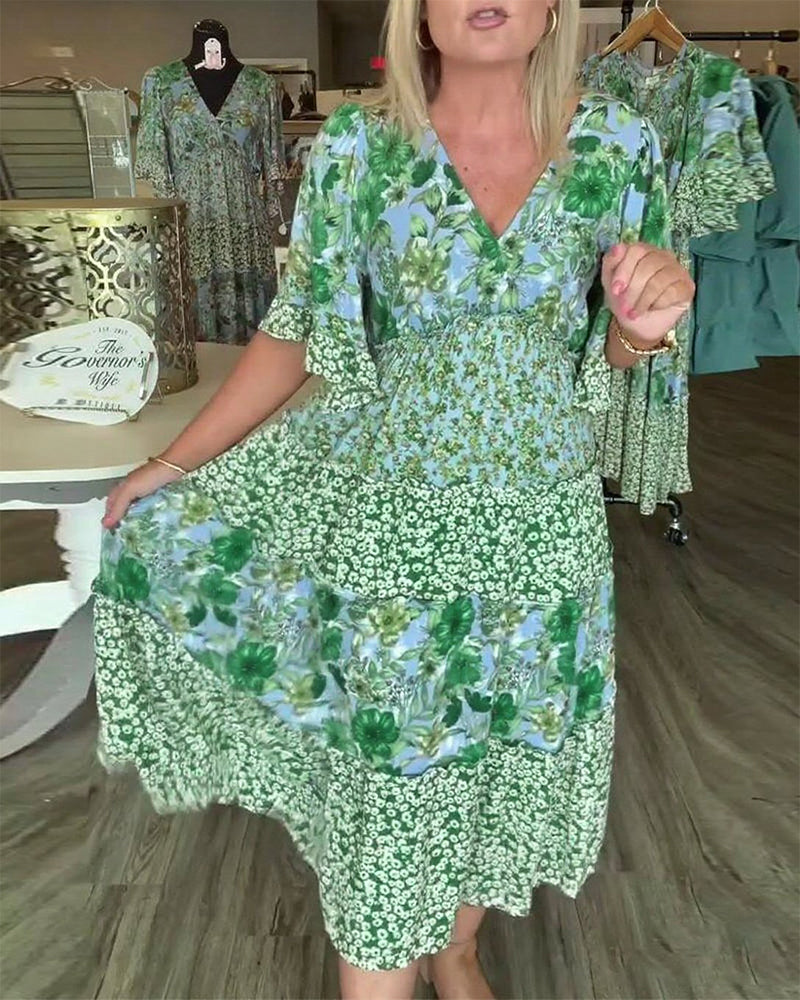 Robe Fleurie à Manches Lotus en V