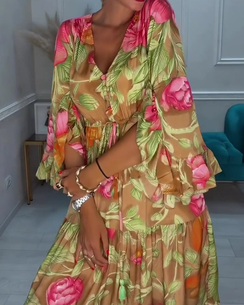 Mosalia | Robe maxi florale avec décolleté en V et jupe évasée