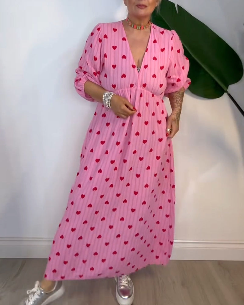 Robe élégante à imprimé cœur et décolleté en V