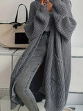 Cardigan long en maille torsadée pour femmes