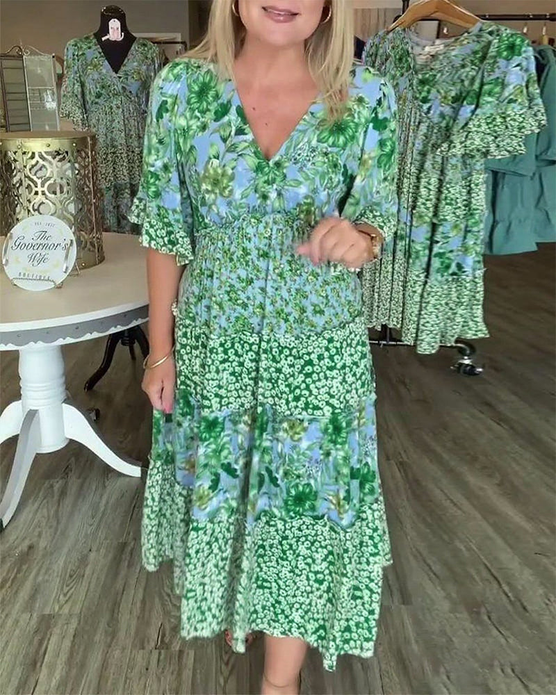 Robe Fleurie à Manches Lotus en V