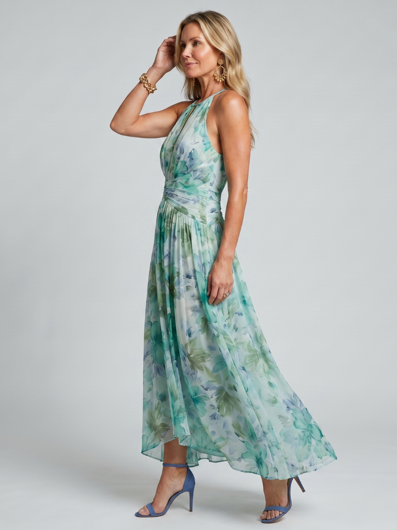 Portia | Robe à bretelles plissée avec un doux motif floral en longueur midi