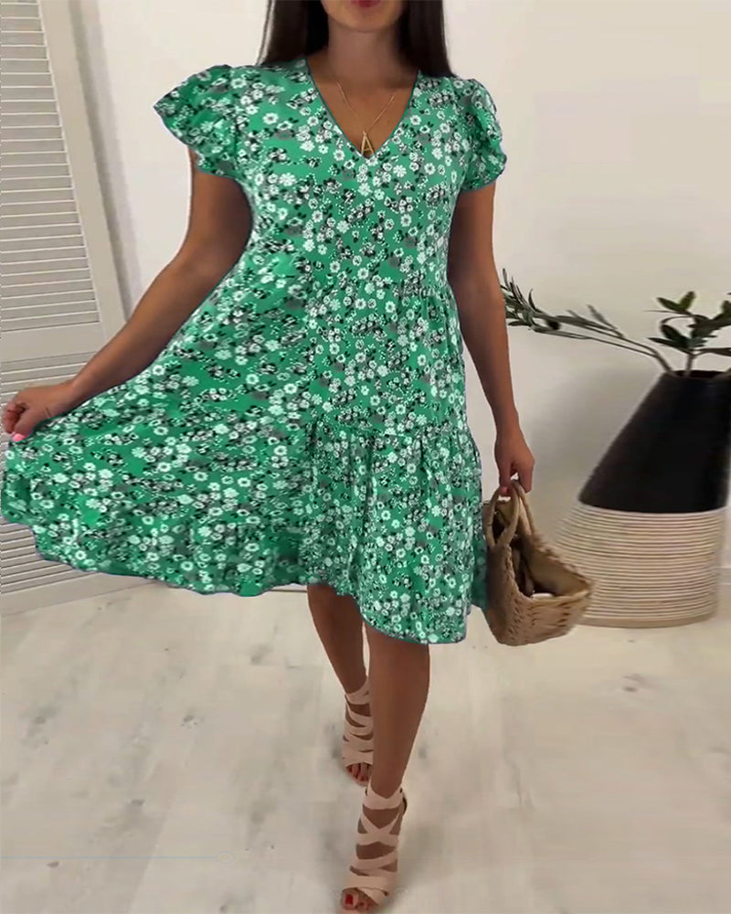 Robe midi sans manches à fleurs avec décolleté en V