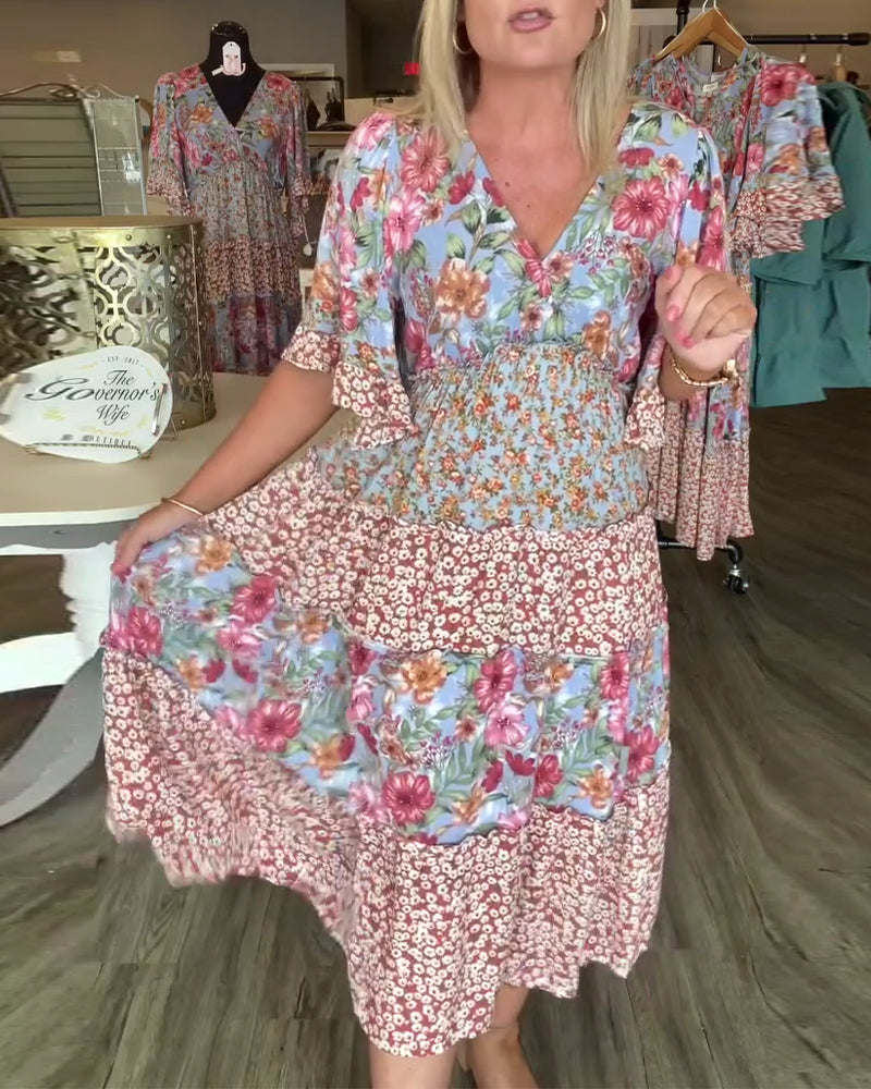 Robe Fleurie à Manches Lotus en V