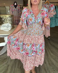 Robe Fleurie à Manches Lotus en V